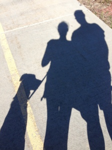 Shadows of my husband, myself, and our dog